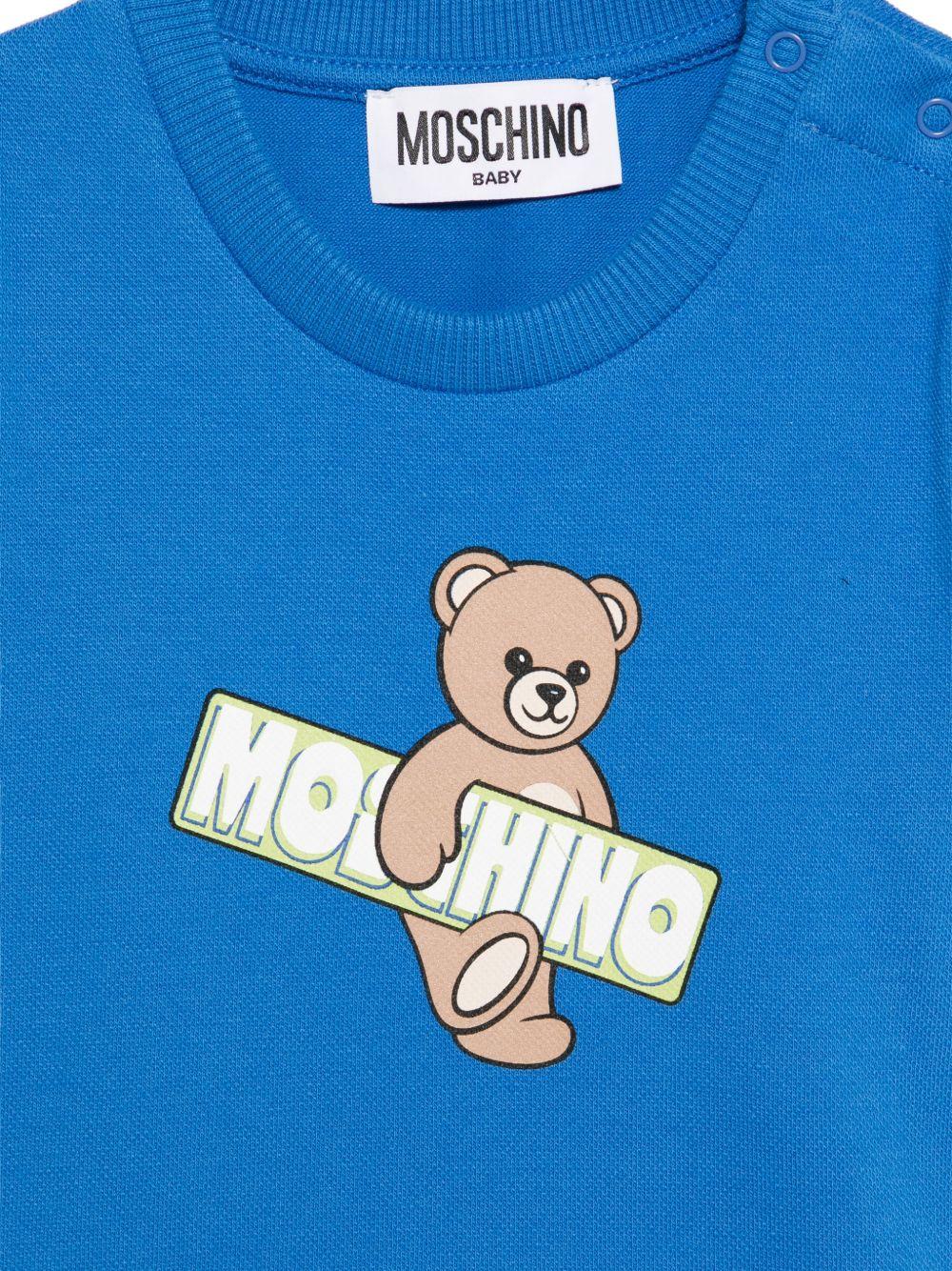 T-shirt per neonati Moschino Kids azzurra con stampa Teddy Bear MOM031LFA07 40630 MOSCHINO KIDS