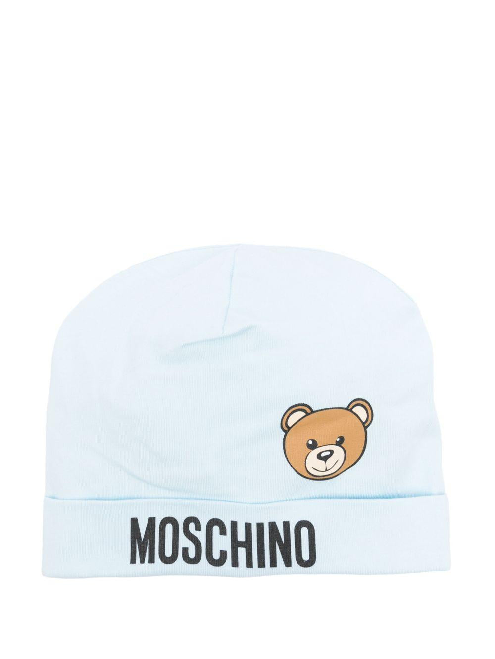 Cappello per neonato Moschino Kids azzurro con stampa logo e Teddy Bear MUX05ALBA00 40304 MOSCHINO KIDS