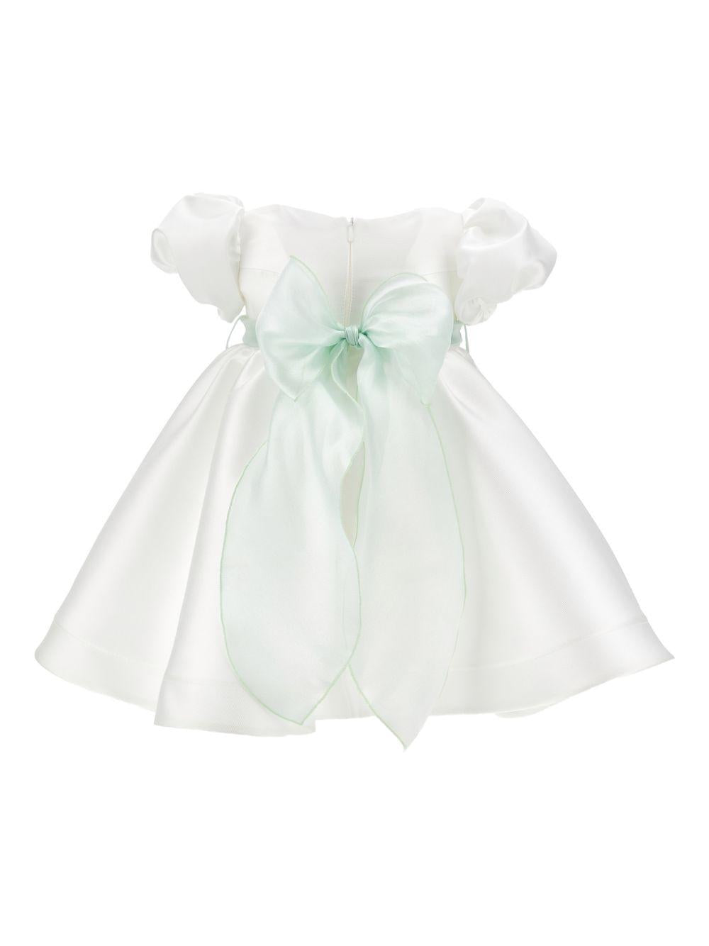 Abito per neonata Monnalisa bianco con dettaglio con fiocco e con fiore 73G903 7302 0120 MONNALISA KIDS