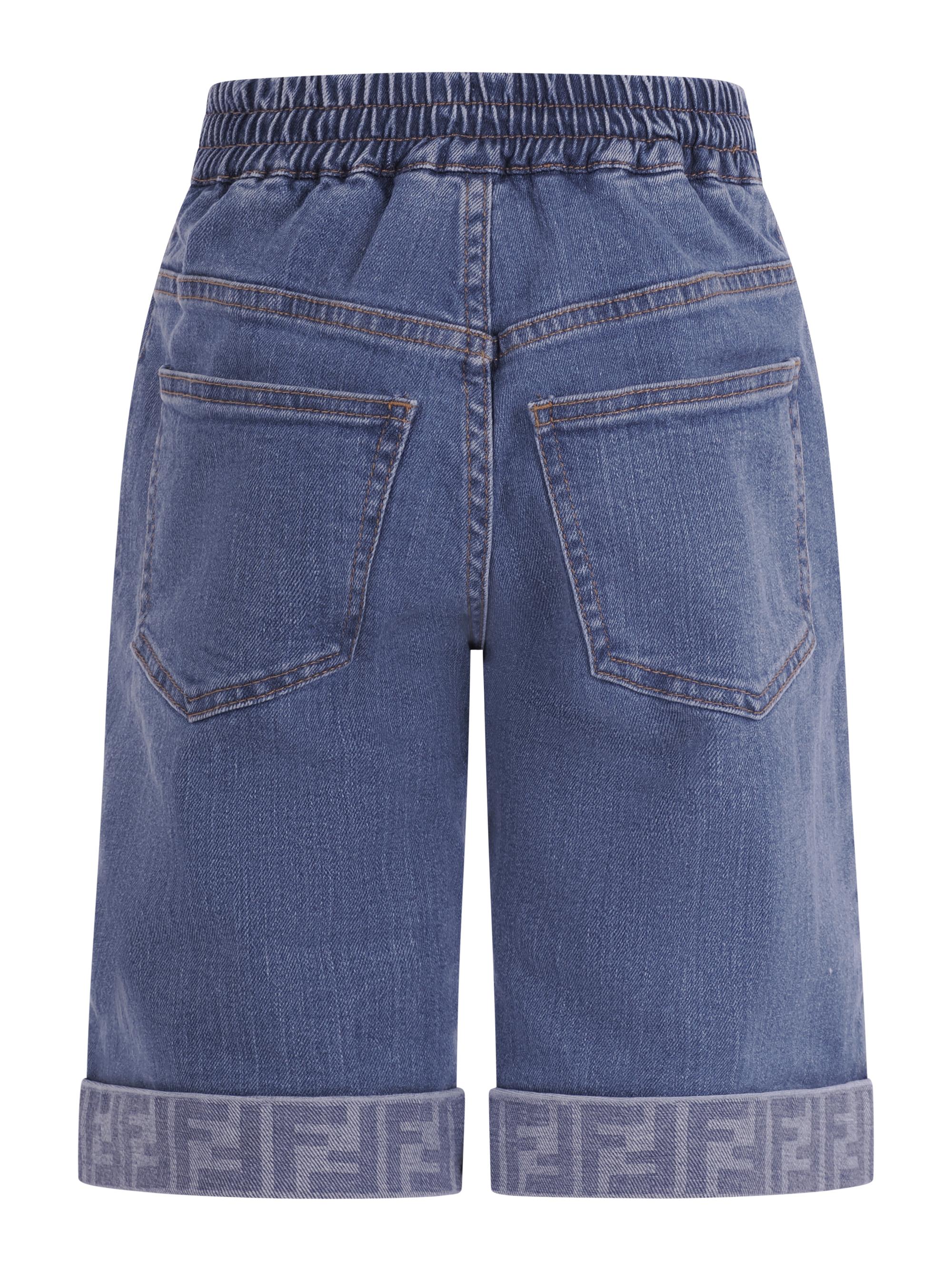 Pantaloni per bambina Fendi Kids denim con dettaglio monogramma FF JMF567 AVVU F0QG0 FENDI KIDS