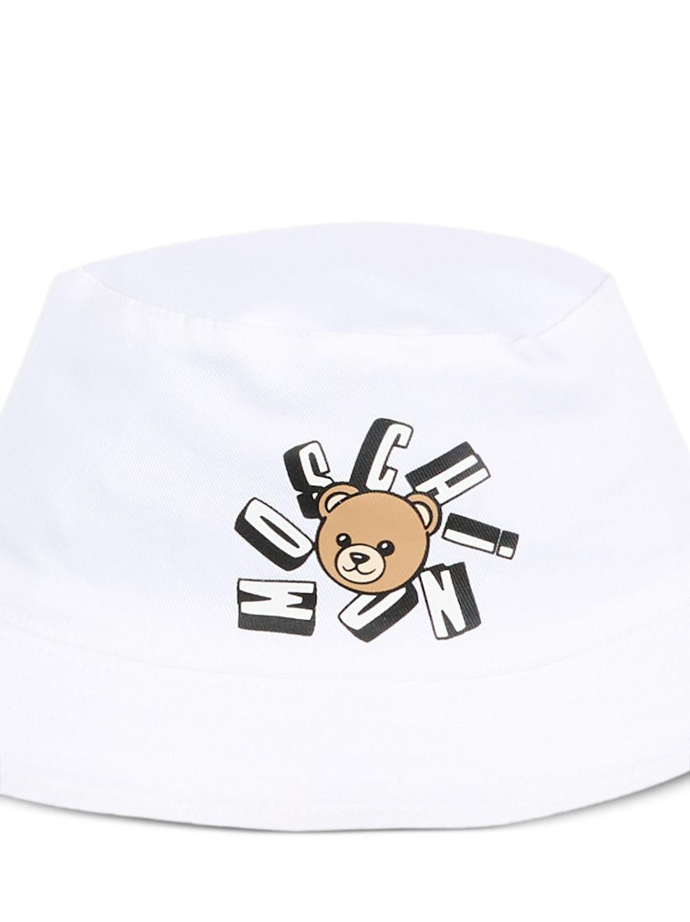 Cappello per neonati Moschino Kids bianco con stampa Teddy Bear MNX057LPA01 10101 MOSCHINO KIDS