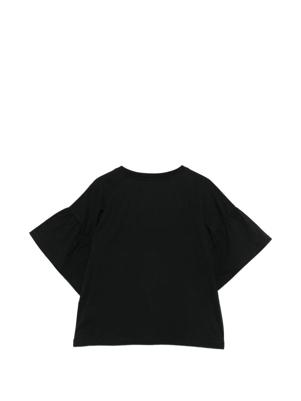 T-shirt per bambina Moschino Kids nera con dettaglio Teddy Bear HDM077LAA23 60100 MOSCHINO KIDS
