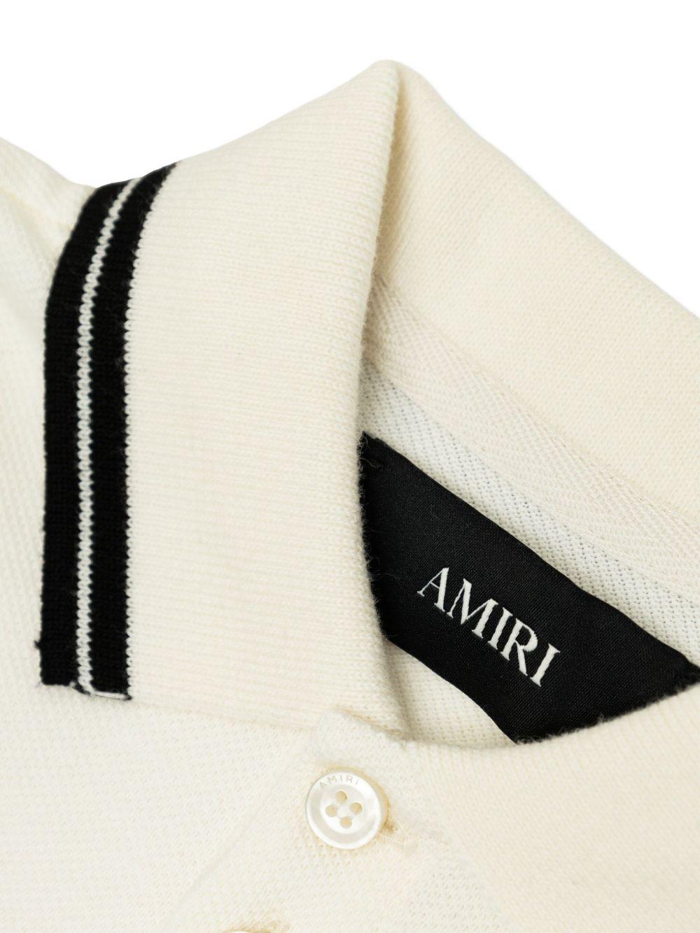 Polo per bambino Amiri Kids bianca con ricamo logo AKJYPO1010 127 AMIRI