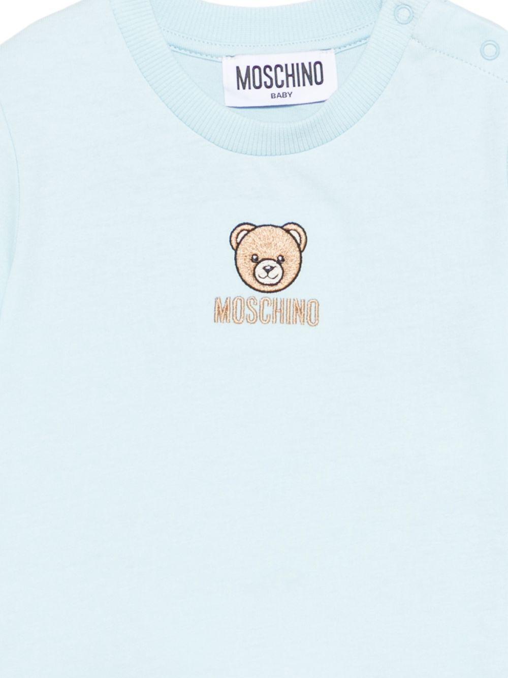 T-shirt per neonati Moschino Kids azzurra con dettagli ricamati MYM047LAA23 40304 MOSCHINO KIDS