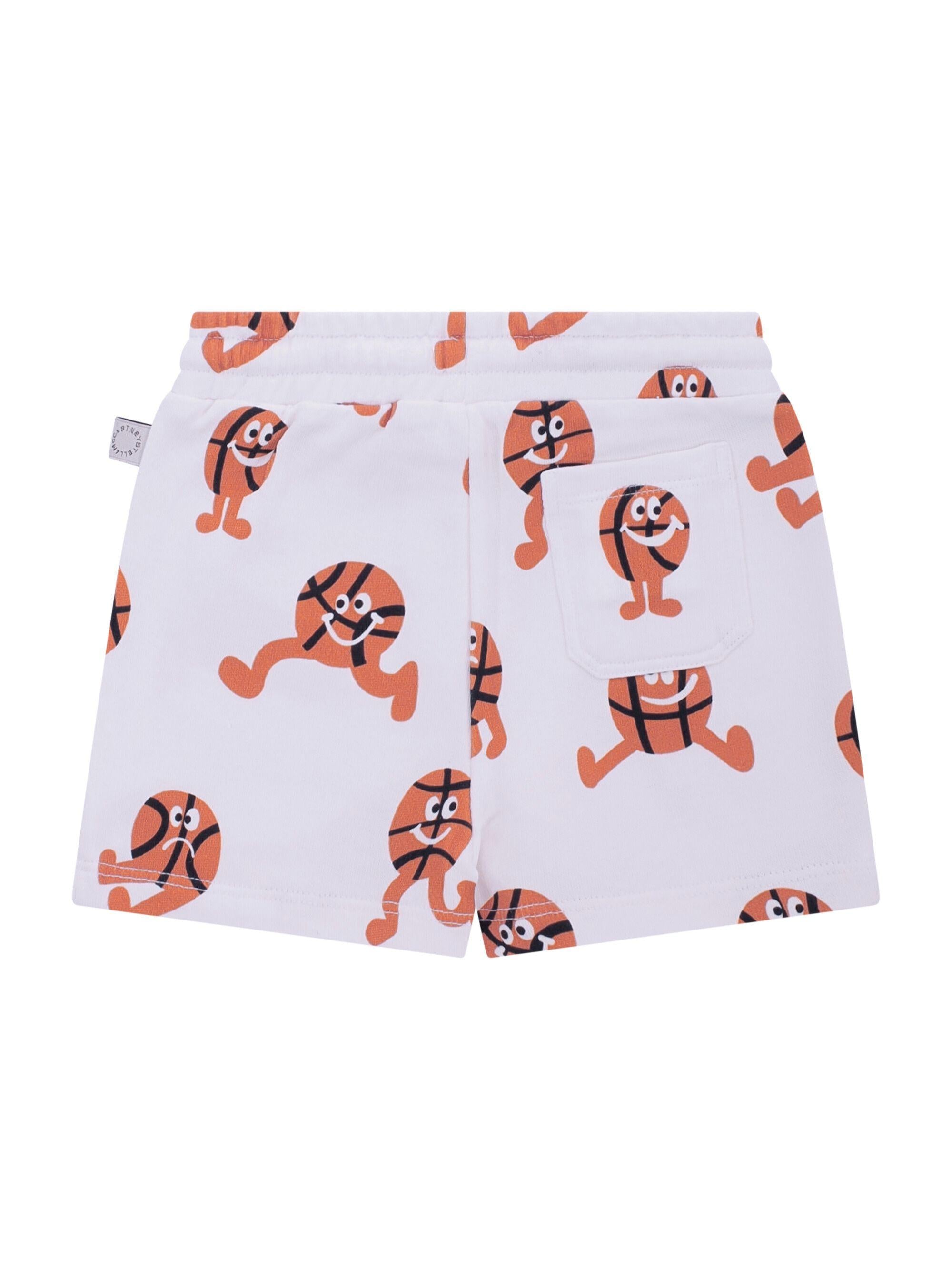 Shorts per neonato Stella McCartney Kids bianchi con stampa basketball all-over TY6639 Z3566 100MC STELLA McCARTNEY KIDS