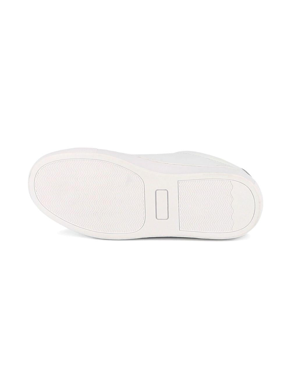 Sneakers per bambino BOSS Kids bianche con dettaglio con placca con logo J52554 10P BOSS KIDS