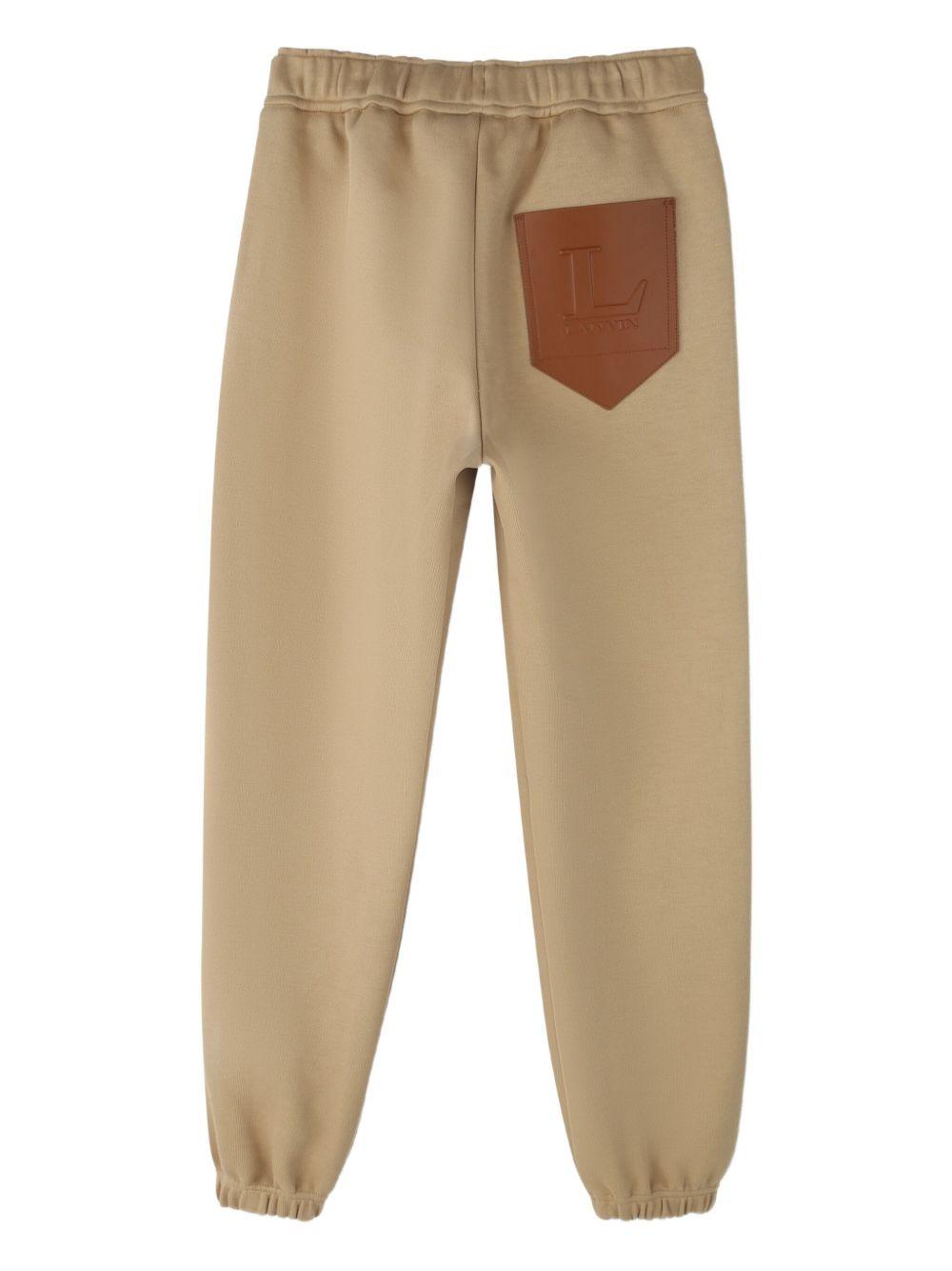 Pantaloni sportivi per bambino Lanvin Enfant beige con applicazione con logo N30299 276 LANVIN