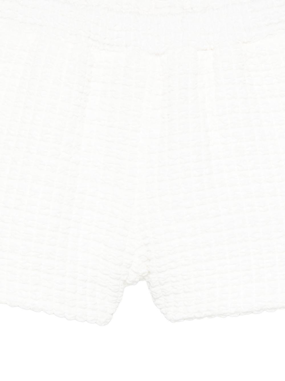 Shorts per bambina Douuod Kids bianchi con finitura in rilievo DY6B39 U0267 100 DOUUOD KIDS