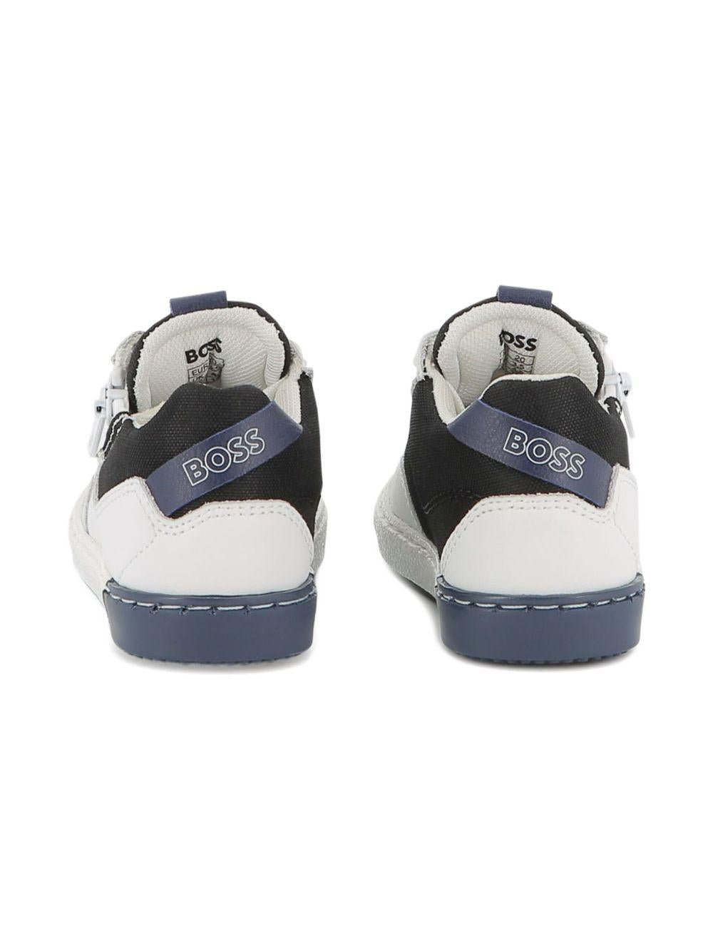 Sneakers per bambino BOSS Kids bianche con design a inserti J52580 10P BOSS KIDS