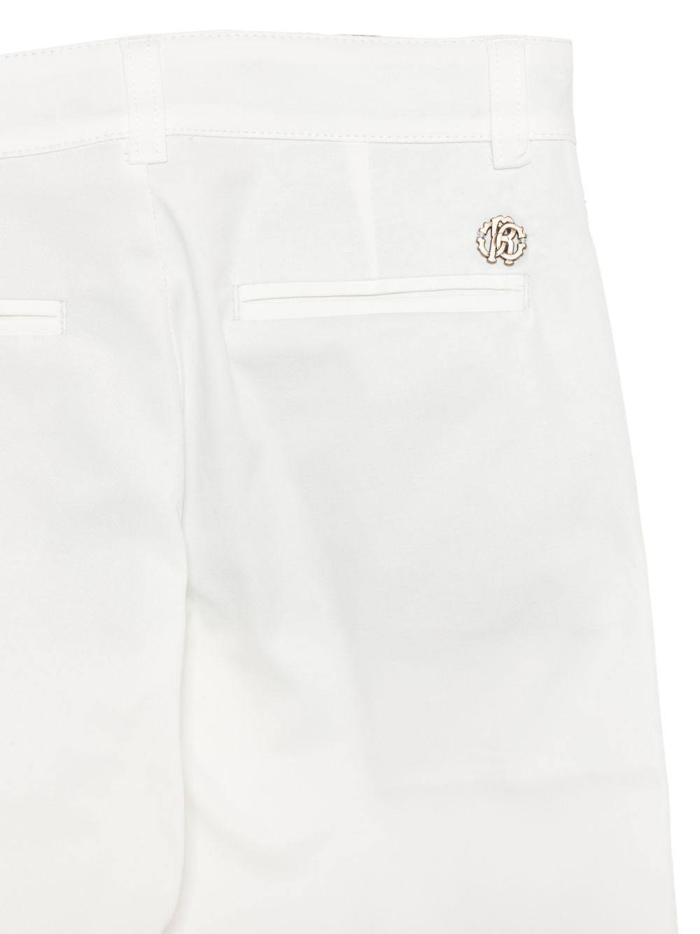 Pantaloni per bambino Roberto Cavalli Kids bianco con placca con logo CBP26002PA WHITE ROBERTO CAVALLI KIDS