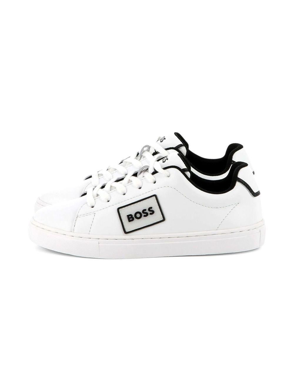 Sneakers per bambino BOSS Kids bianche con dettaglio con placca con logo J52554 10P BOSS KIDS