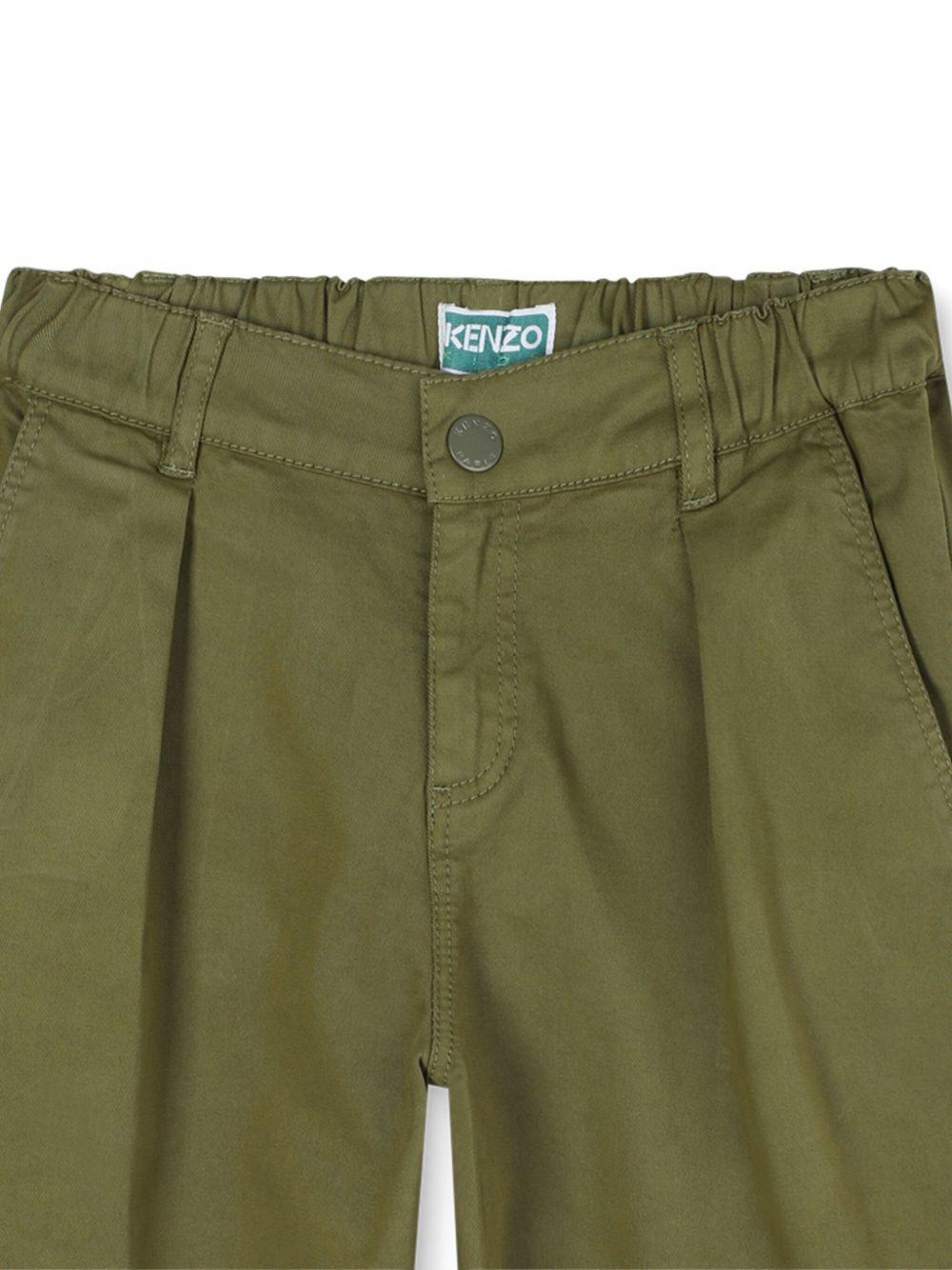 Pantaloni per bambino Kenzo Kids verdi con dettagli plissettati K61439 64T KENZO KIDS