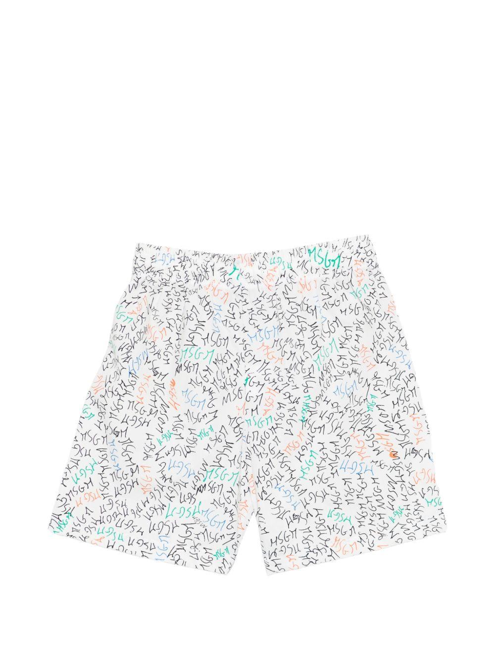 Shorts per bambino MSGM Kids bianchi con stampa logo all-over S6MSJBBE234 001 MSGM KIDS