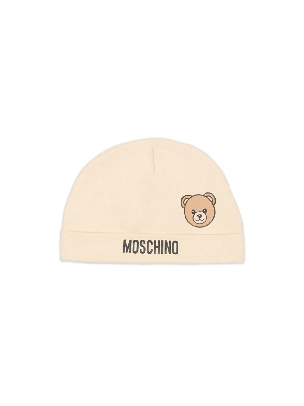 Berretto per neonati Moschino Kids beige con motivo orsetto MUX05ULCA19 20404 MOSCHINO KIDS