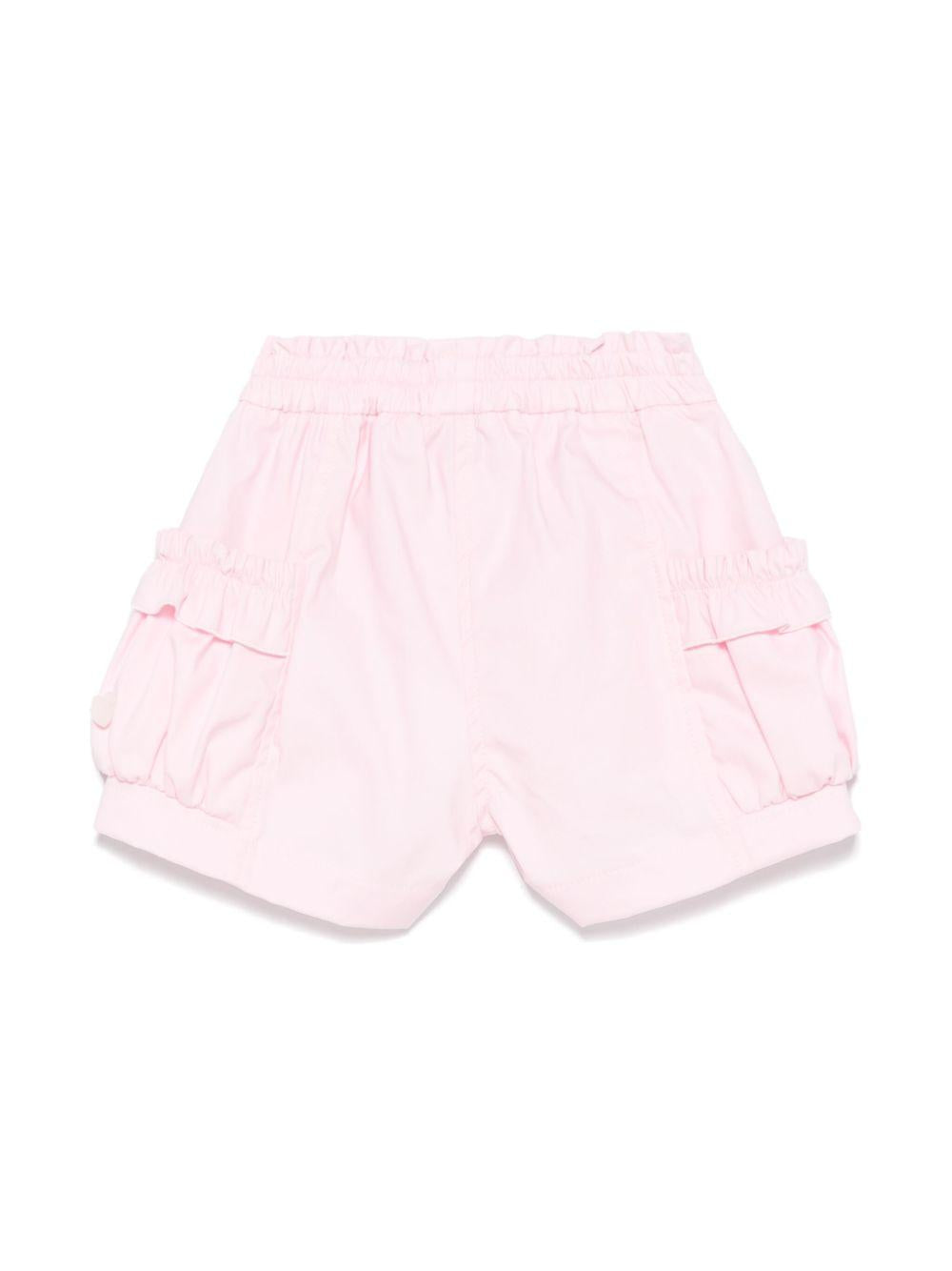 Shorts per neonata Monnalisa rosa con rifiniture ruches 37E403 5301 0090 MONNALISA