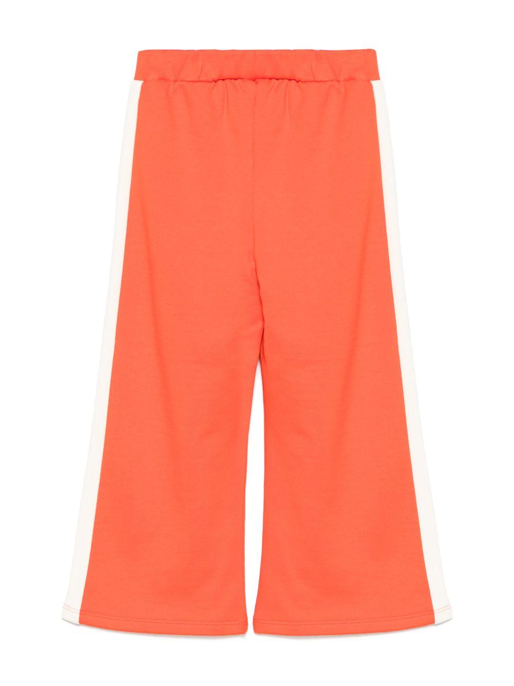 Pantaloni sportivi per bambina Mini Rodini Note rosso con dettaglio laterale a righe 2523011142 RED MINI RODINI KIDS
