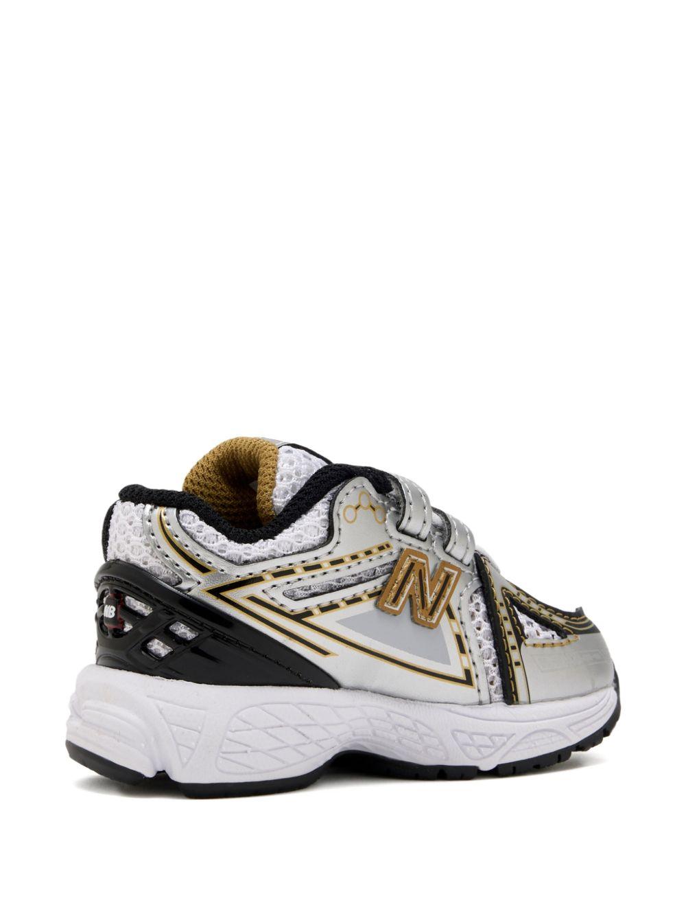 Sneakers 1906 per bambino New Balance Kids grigie con inserti a contrasto IV1906 RA NEW BALANCE KIDS