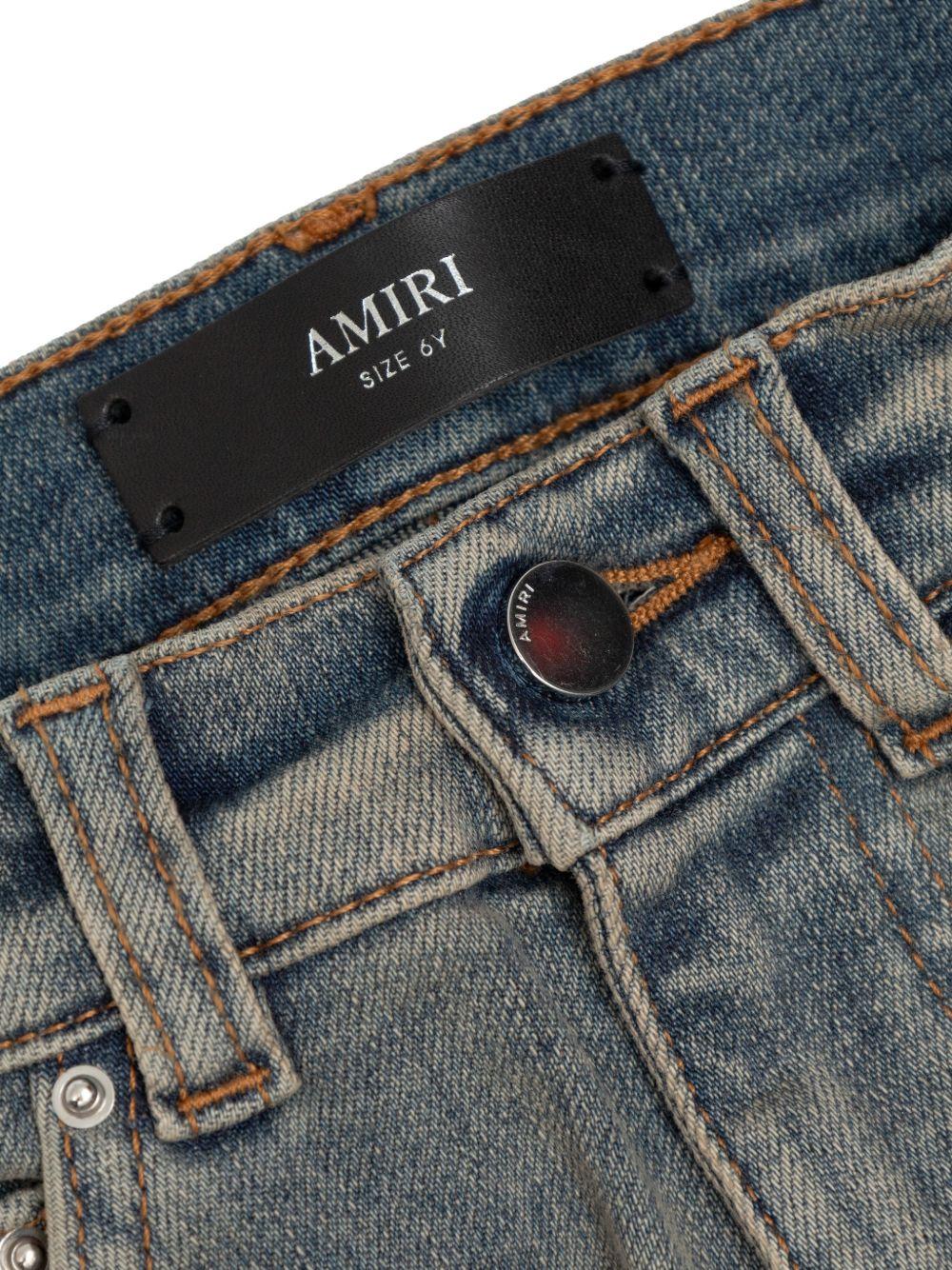 Jeans per bambino Amiri Kids denim con applicazione con ossa ACBMPA1006 406 AMIRI KIDS