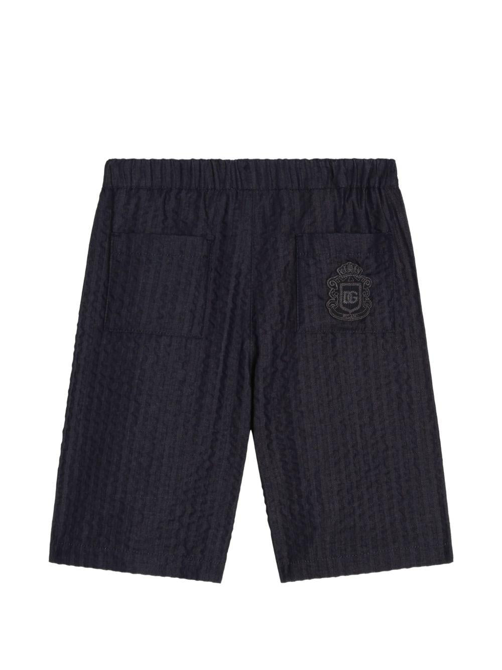 Shorts per bambino Dolce & Gabbana Kids neri con logo ricamato sul retro L44Q10 LDD54 S9000 DOLCE & GABBANA KIDS