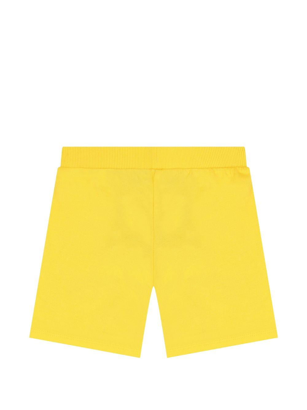Pantaloncini per neonato Moschino Kids gialli con stampa grafica tre Teddy Bear MUQ01ULAA17 50577 MOSCHINO KIDS