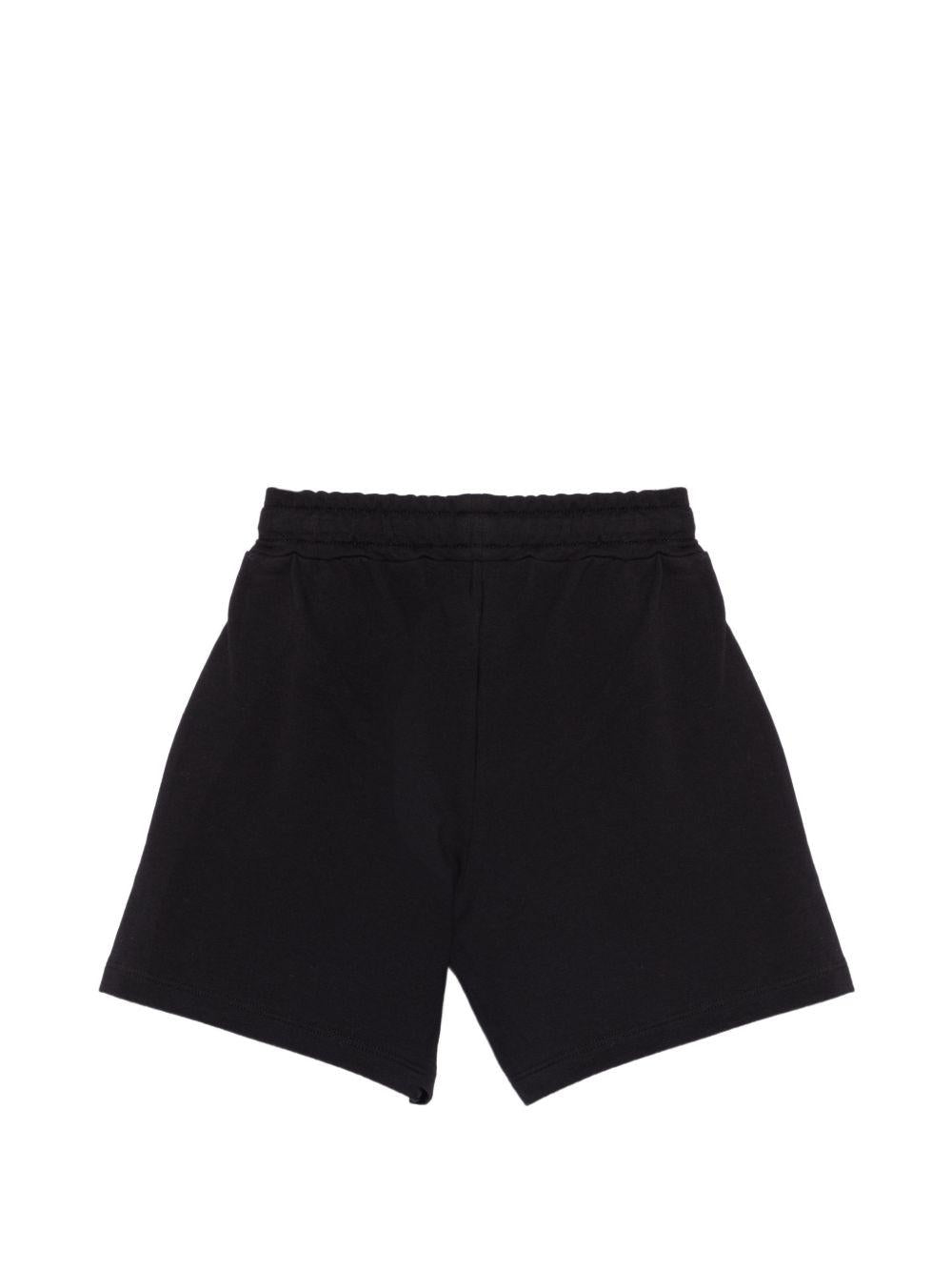 Shorts per bambina Moschino Kids neri con dettagli in strass HDQ020LDA25 60100 MOSCHINO KIDS