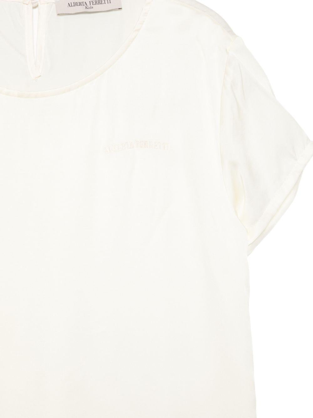T-shirt per bambina Alberta Ferretti Kids bianca con logo ricamato sul davanti R1G603 7142 0035 ALBERTA FERRETTI KIDS