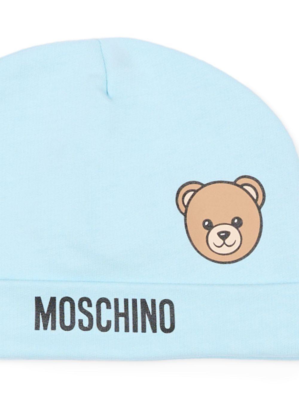 Berretto per neonato Moschino Kids azzurro con motivo orsetto MUX05ULCA19 40304 MOSCHINO KIDS