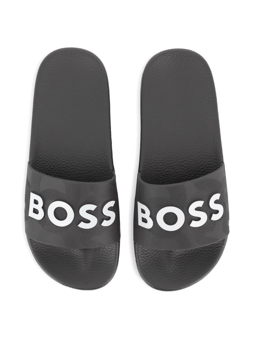 Sandali per bambino Boss Kids neri con logo groffato J52669 09B BOSS KIDS