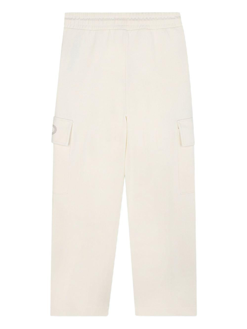 Pantaloni sportivi per bambina Michael Kors Kids bianchi con tasche cargo R30453 190 MICHAEL KORS KIDS