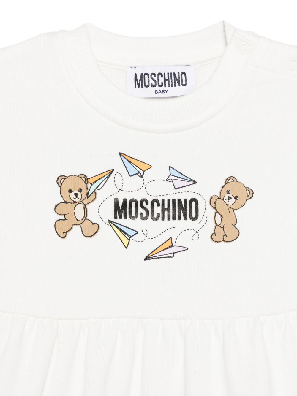 Abito per neonata Moschino Kids bianco con stampa due Teddy Bear MDV0DFLCA86 10063 MOSCHINO KIDS