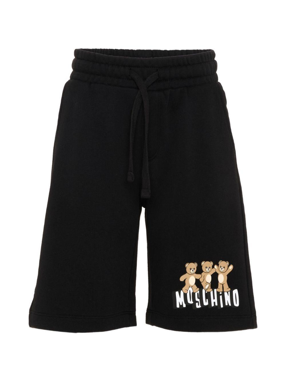 Shorts per bambino Moschino Kids nero con stampa tre Teddy Bear HUQ02MLCA89 60100 MOSCHINO KIDS