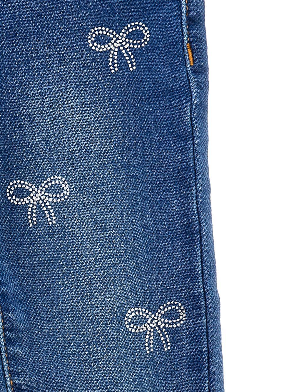 Jeans dritti per neonata Monnalisa in denim con stampa con fiocco 39F400 6042 0055 MONNALISA