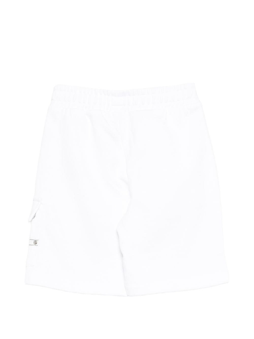 Shorts per bambino Moschino Kids bianco con dettaglio logo sulla tasca HUQ02OLCA86 10101 MOSCHINO KIDS