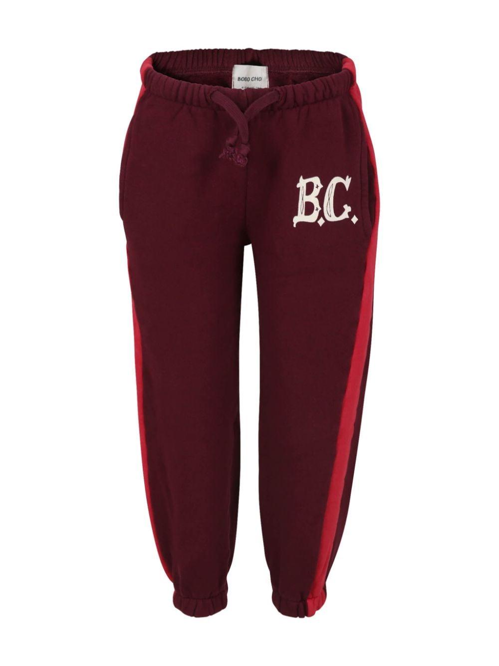 Joggers con stampa per bambina Bobo Choses rosso con dettaglio laterale a righe B224AC081 641 BOBO CHOSES