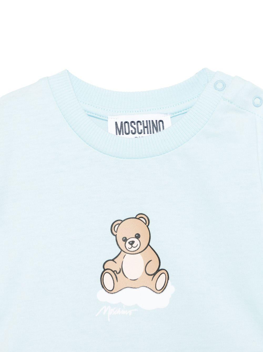 Set T-shirt e shorts per neonato Moschino Kids azzurro con stampa nuvole MUG01QLLB61 83679 MOSCHINO KIDS