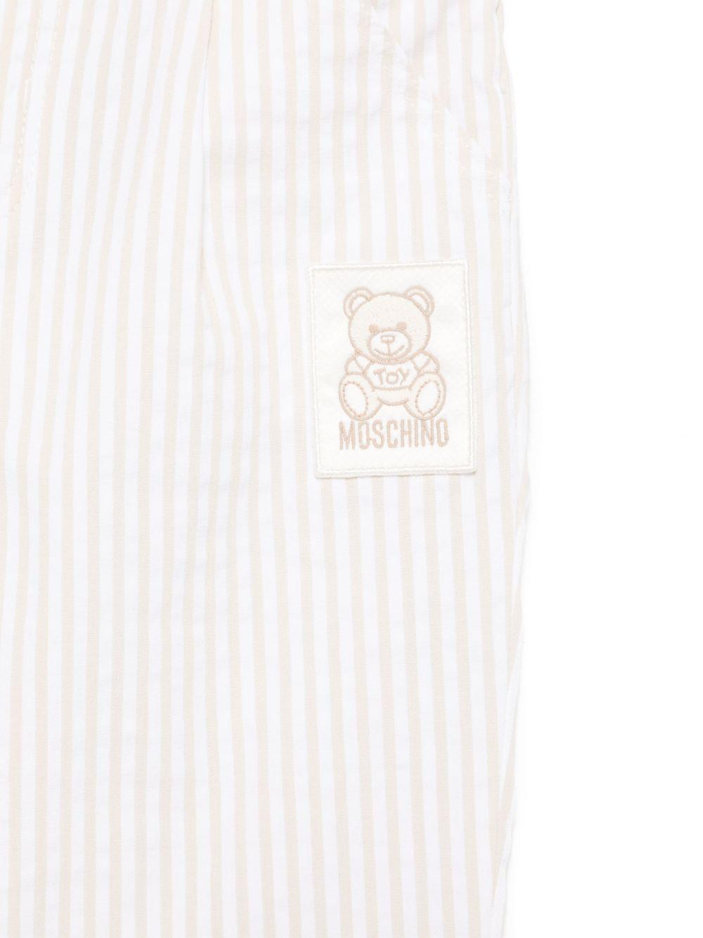Pantaloni a righe per neonata Moschino Kids beige con passanti MUP05ELYE01 84313 MOSCHINO KIDS