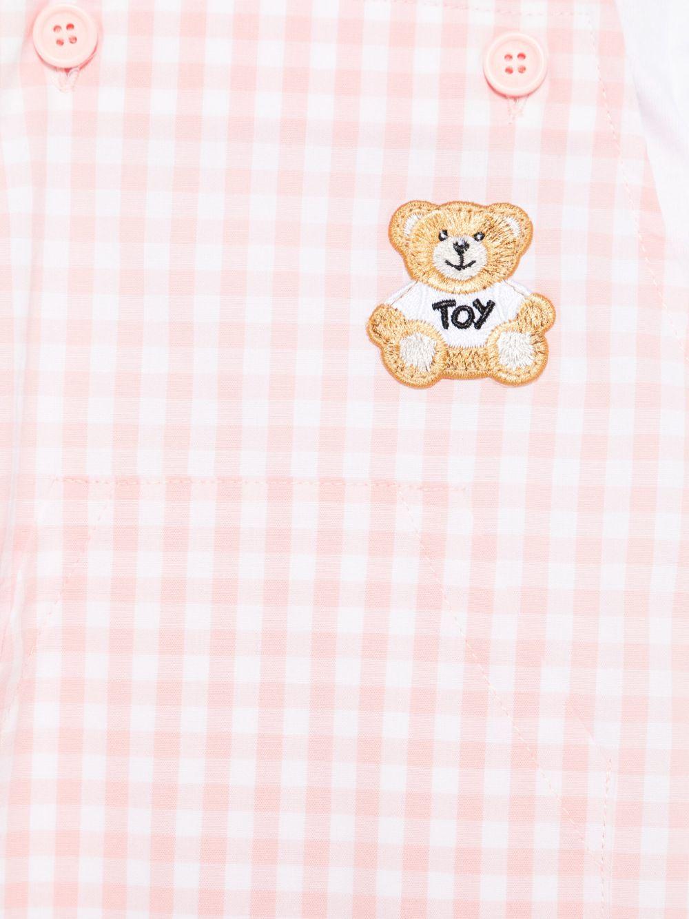 Salopette a quadretti per neonata Moschino Kids rosa con tasca frontale a marsupio MUG01DLME05 85010 MOSCHINO KIDS