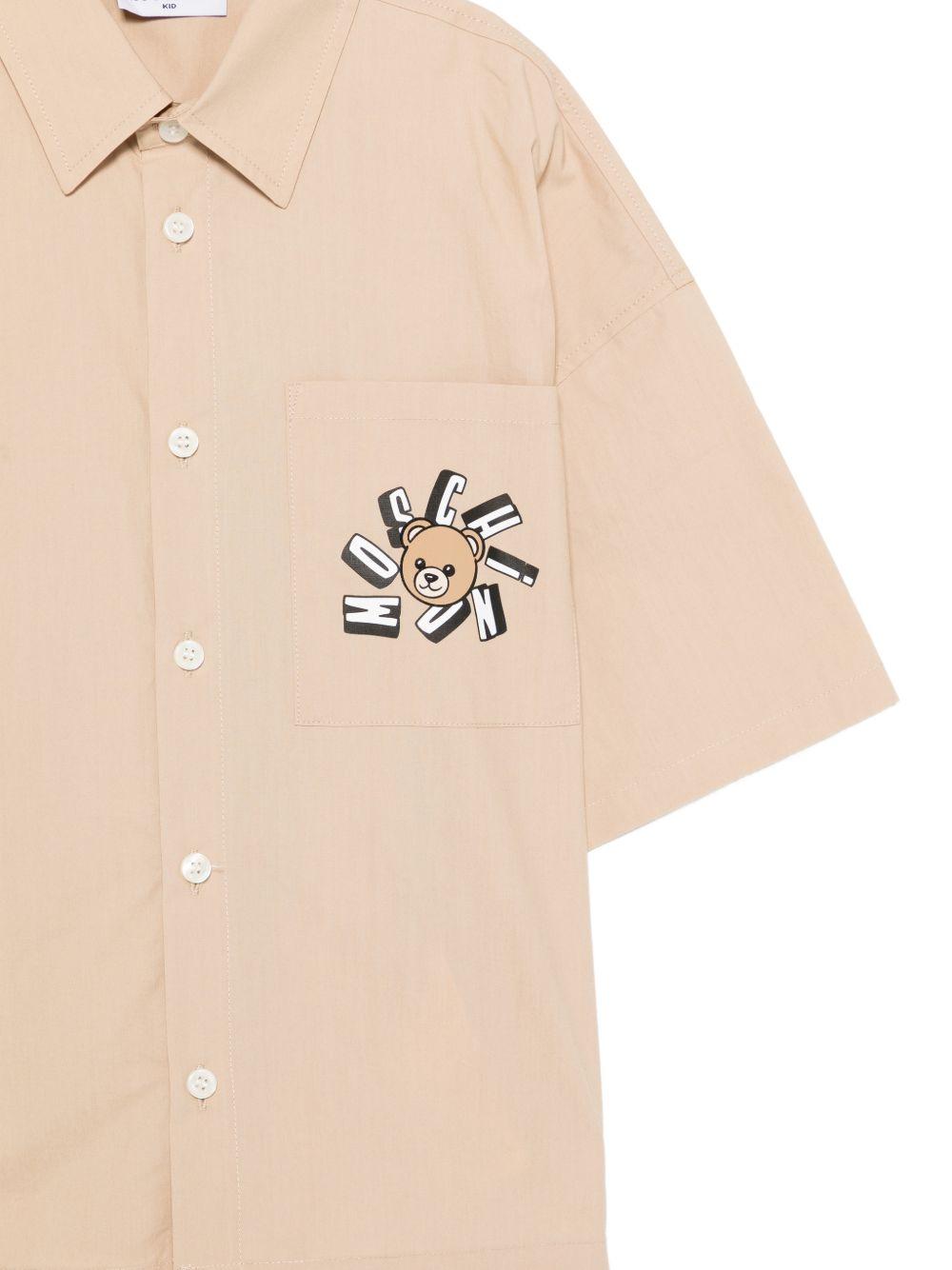 Camicia per bambino Moschino Kids beige con stampa grafica sul petto HUC01WLLA10 20829 MOSCHINO KIDS
