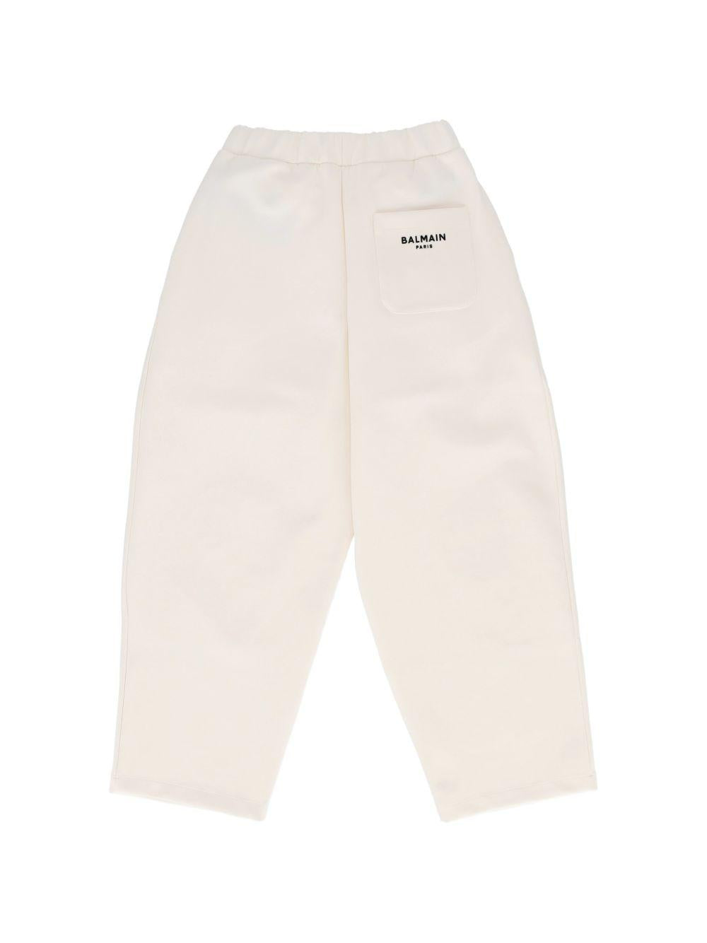 Pantaloni sportivi per bambina Balmain Kids bianchi con logo sul retro BZ6A80 Z3728 102NE BALMAIN KIDS