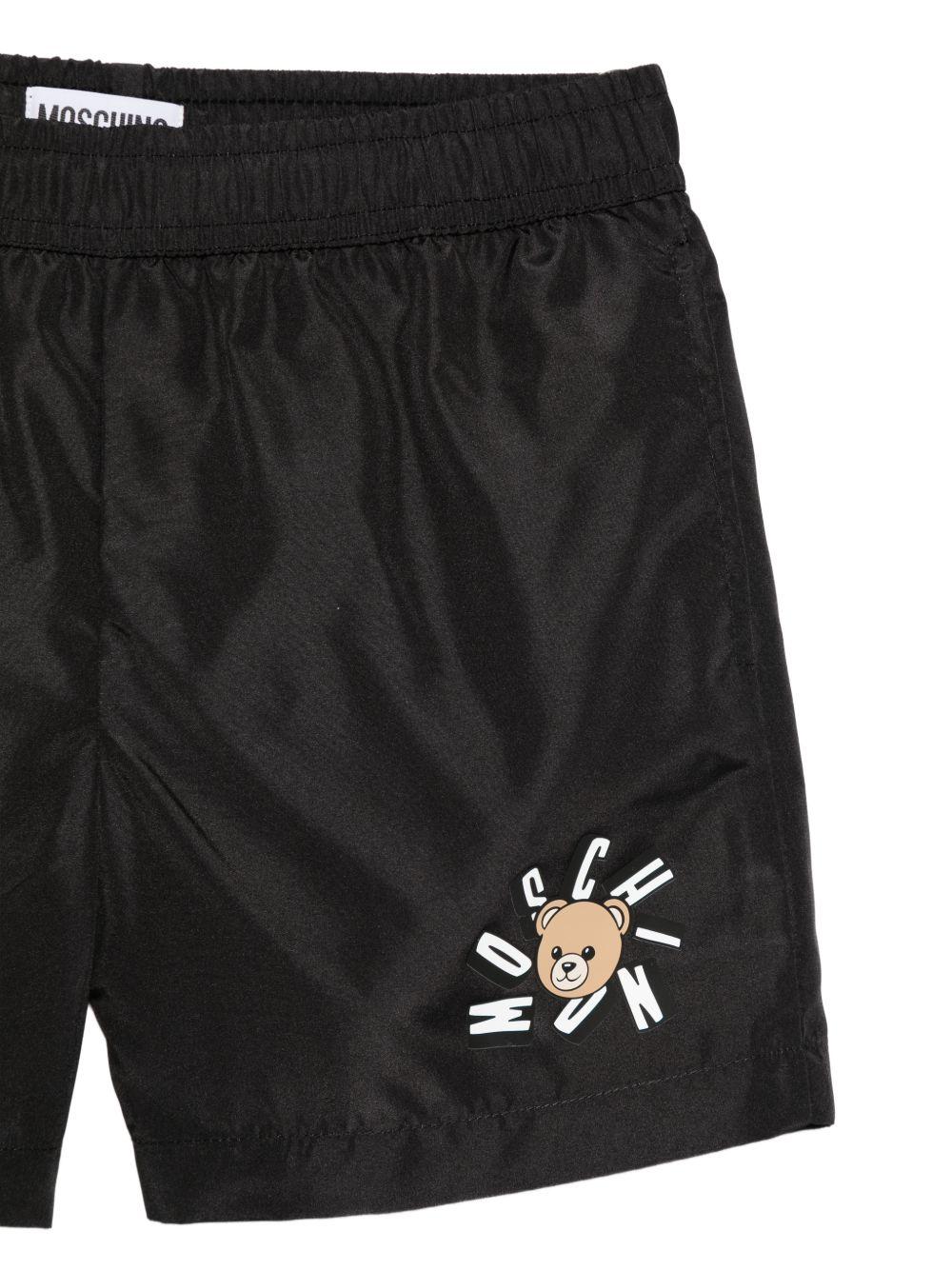 Costume per bambino Moschino Kids nero con logo sul davanti HUL01LLKA02 60100 MOSCHINO KIDS