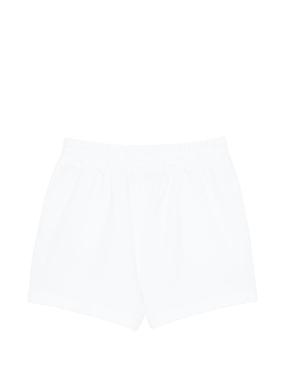 Shorts per bambini Moschino Kids bianchi con stampa Teddy Bear HDQ025LCA19 10101 MOSCHINO KIDS