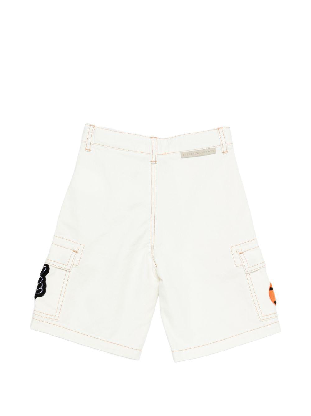 Cargo corti per bambino Stella McCartney Kids bianchi con applicazione TY6Q49 Z2661 101 STELLA McCARTNEY KIDS