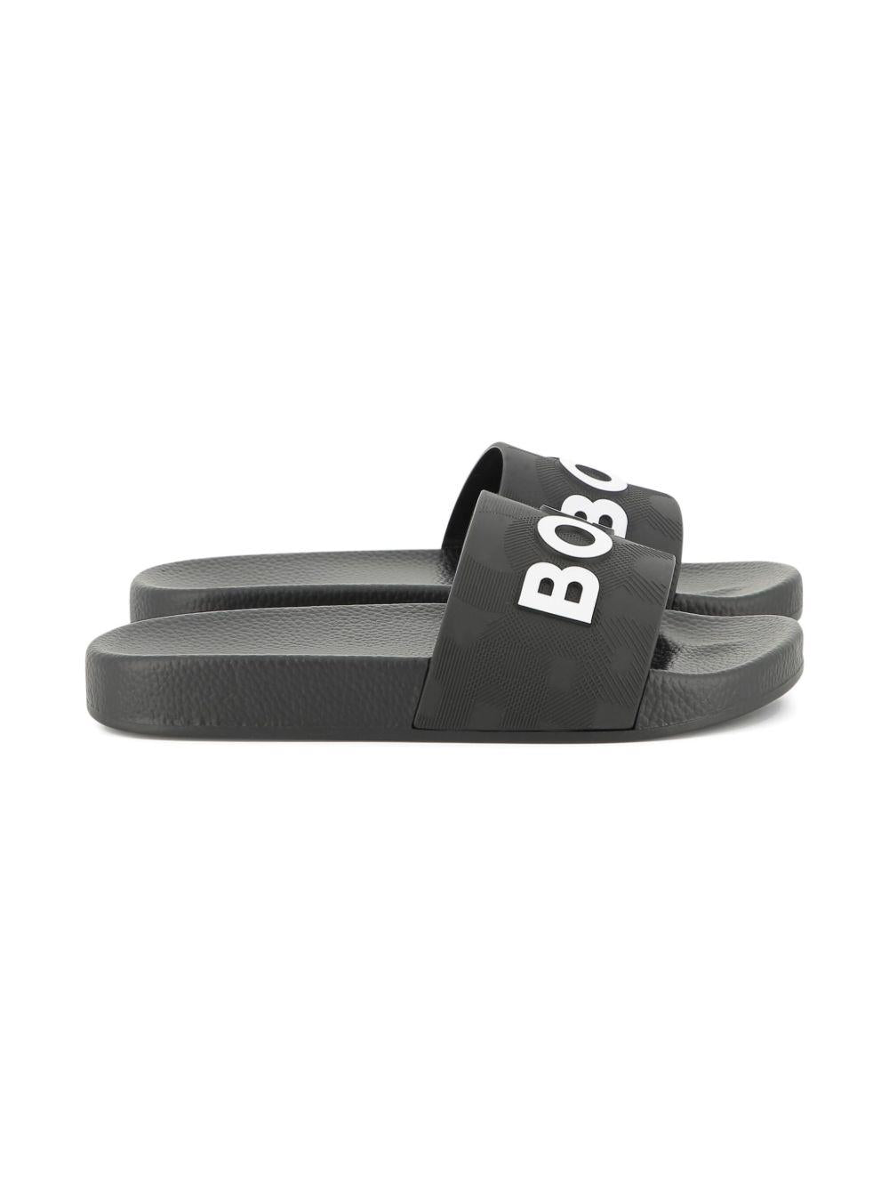 Sandali per bambino Boss Kids neri con logo groffato J52669 09B BOSS KIDS