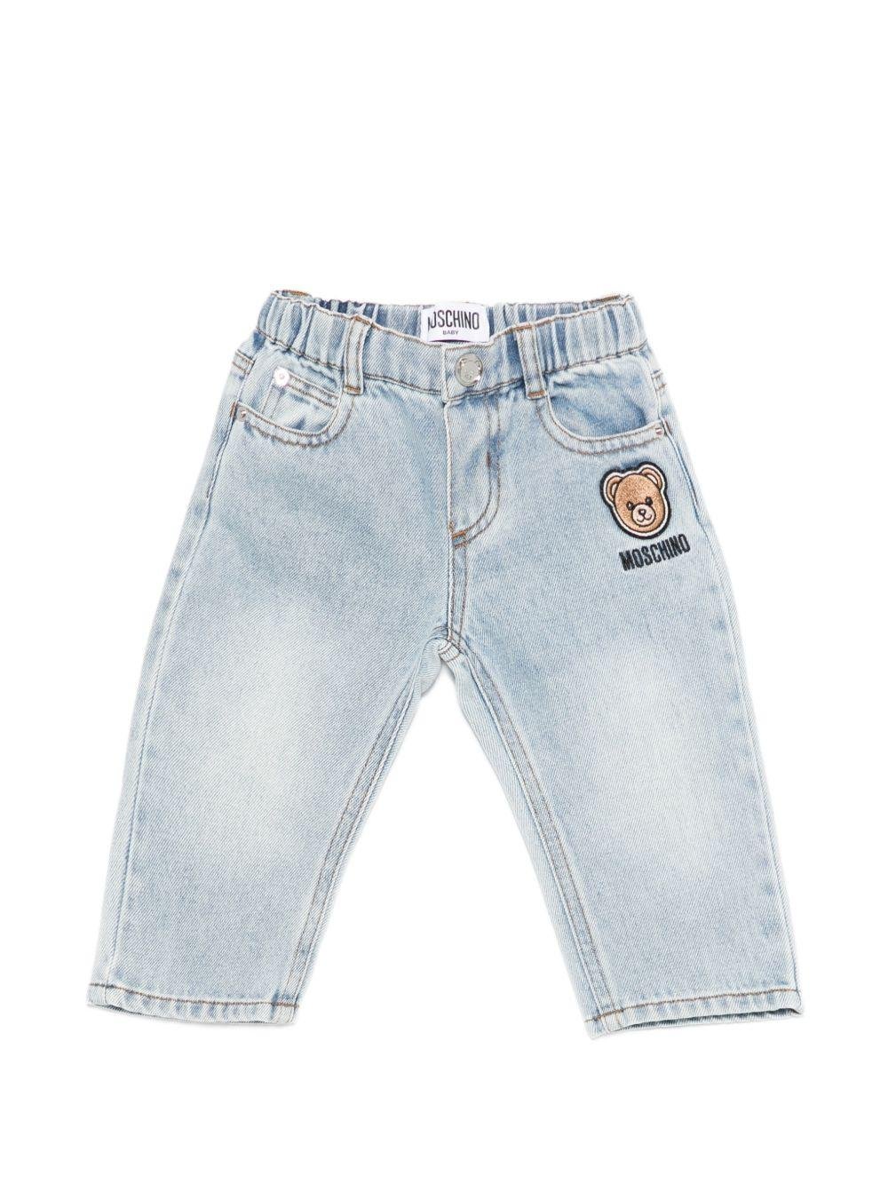 Jeans per neonato Moschino Kids in denim con dettaglio applicato - Rubino Kids