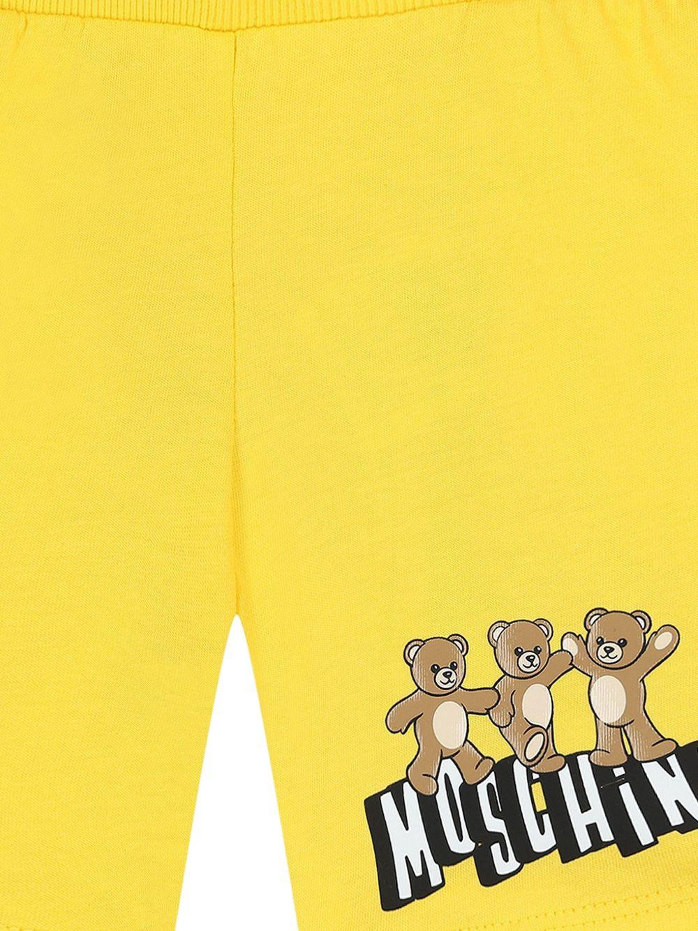 Pantaloncini per neonato Moschino Kids gialli con stampa grafica tre Teddy Bear - Rubino Kids