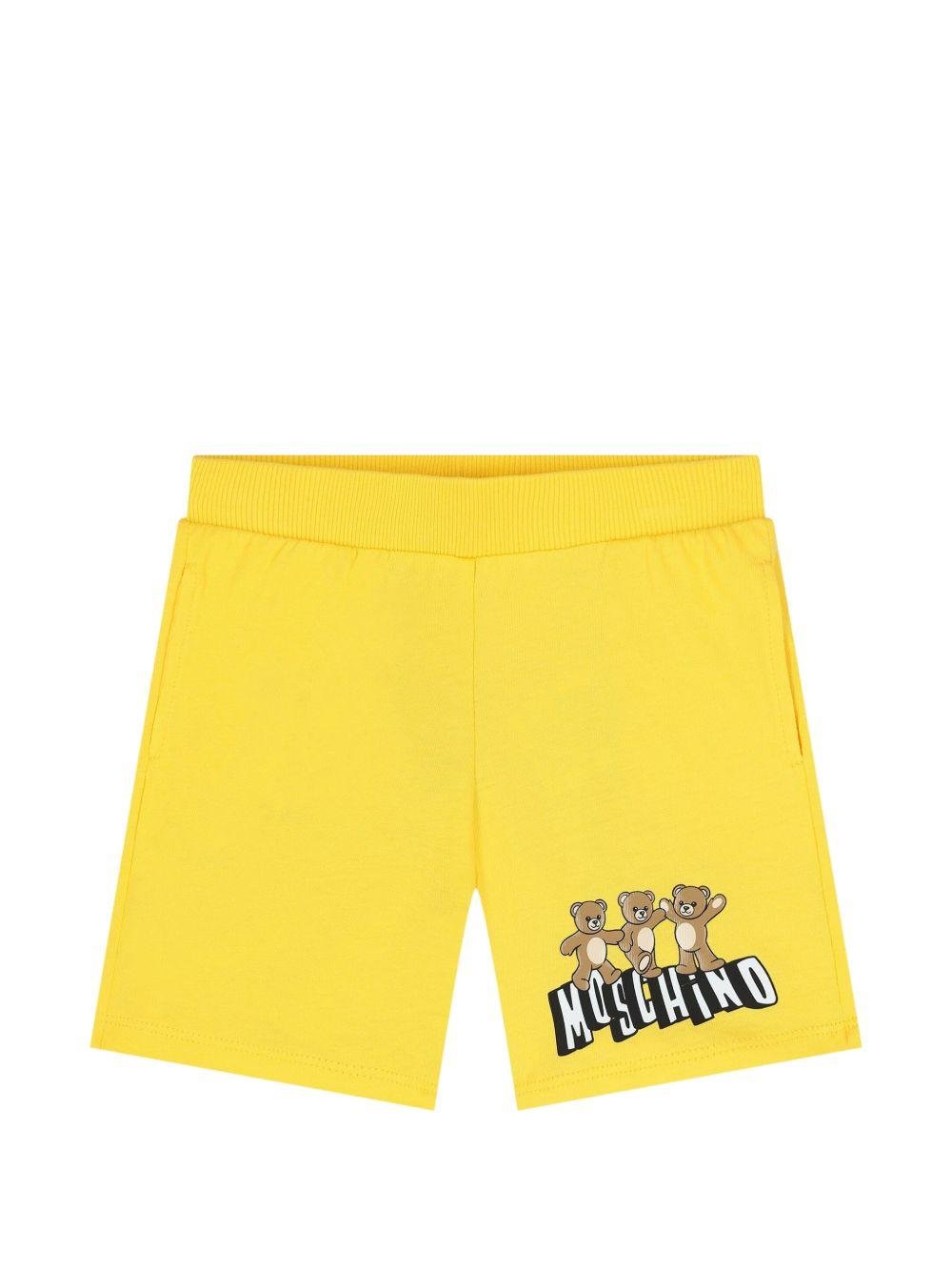 Pantaloncini per neonato Moschino Kids gialli con stampa grafica tre Teddy Bear - Rubino Kids