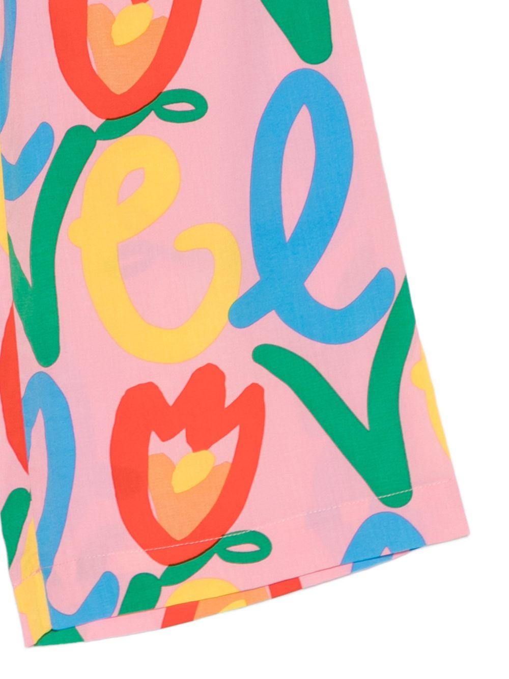 Pantalone per bambina Stella McCartney Kids rosa con stampa floreale - Rubino Kids