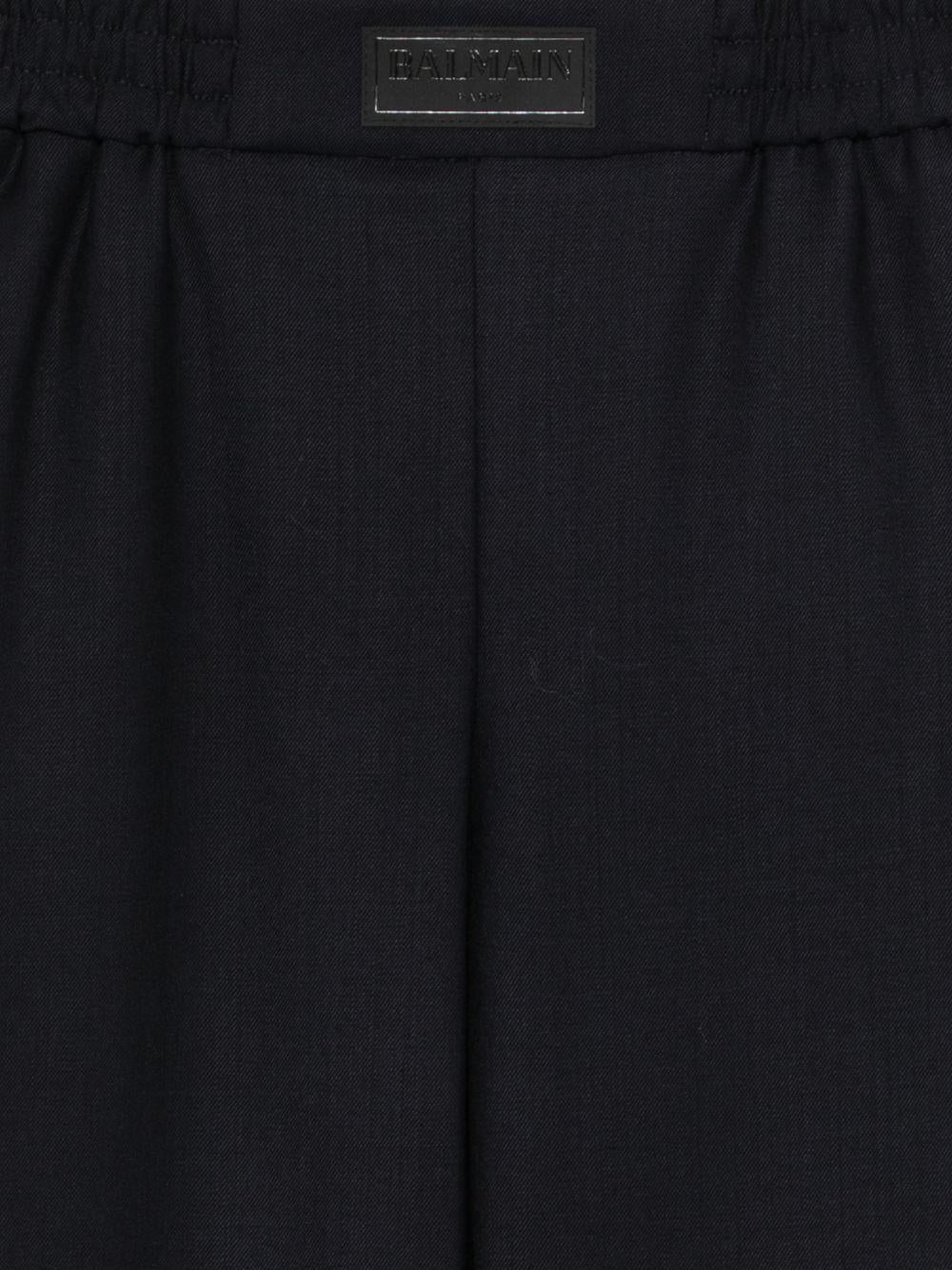 Pantaloni per bambino Balmain Kids blu con toppa con logo sul davanti - Rubino Kids