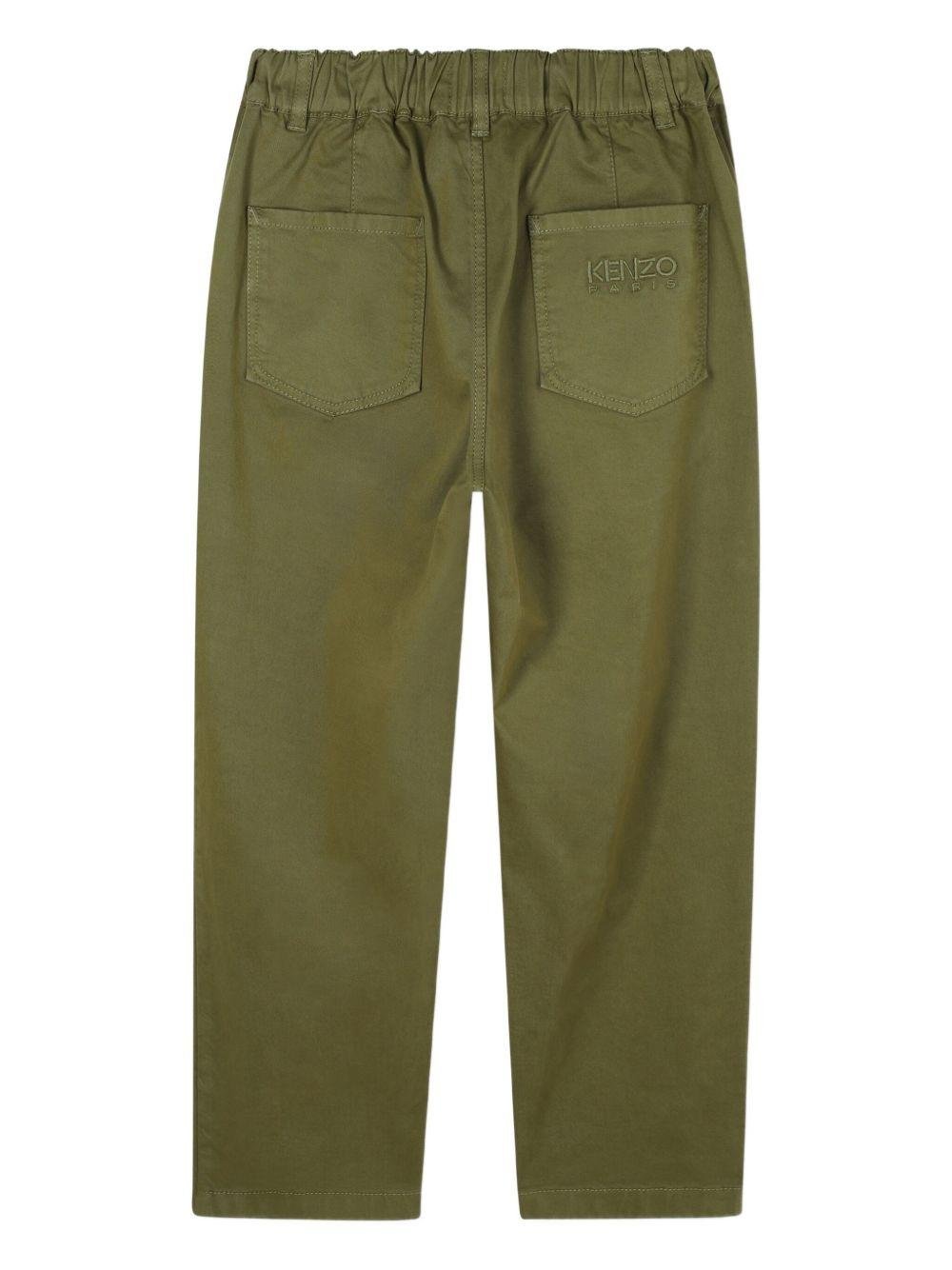 Pantaloni per bambino Kenzo Kids verdi con dettagli plissettati - Rubino Kids