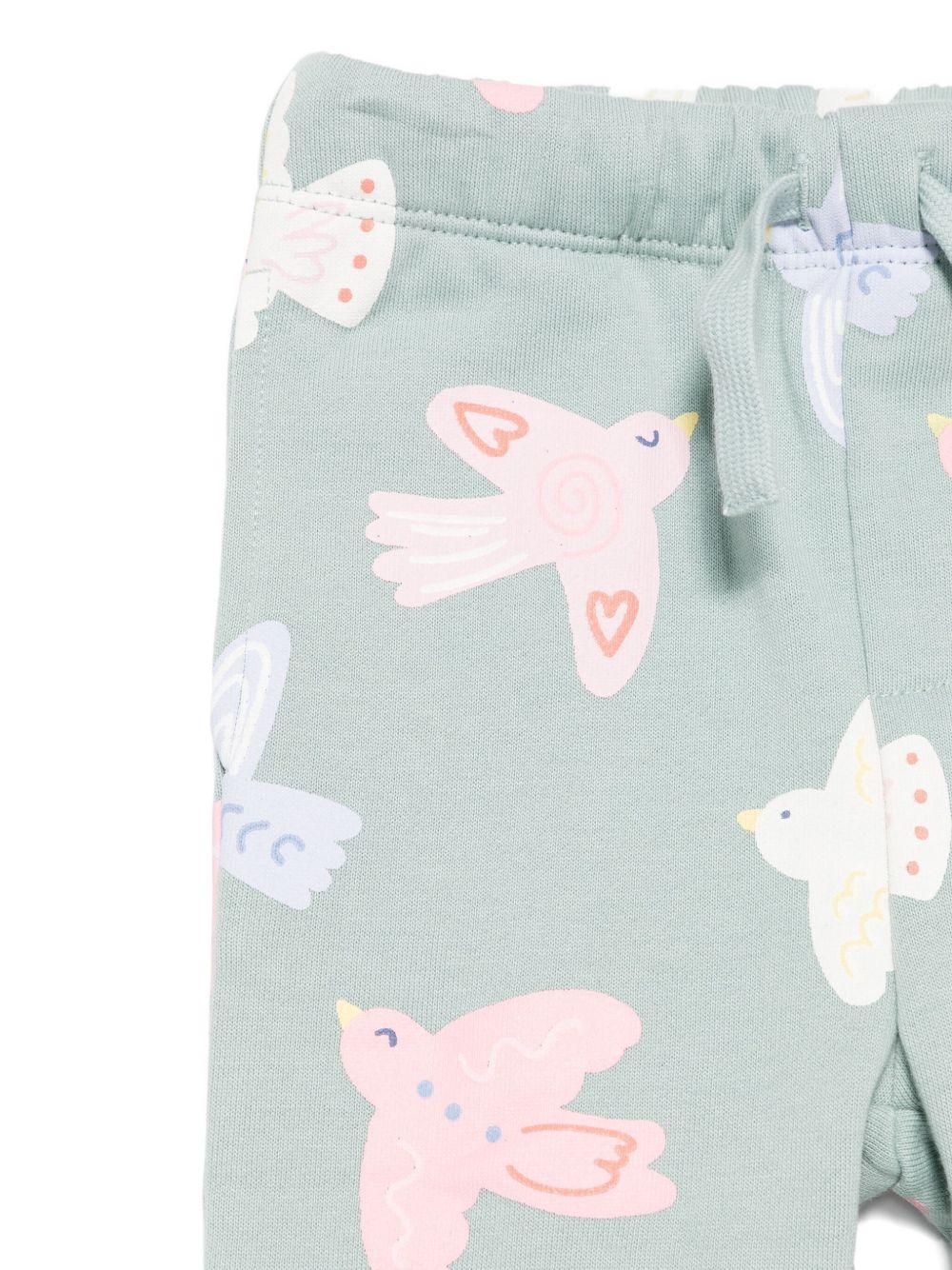 Pantaloni per neonata Stella McCartney Kids verde con coulisse e stampa di uccelli - Rubino Kids